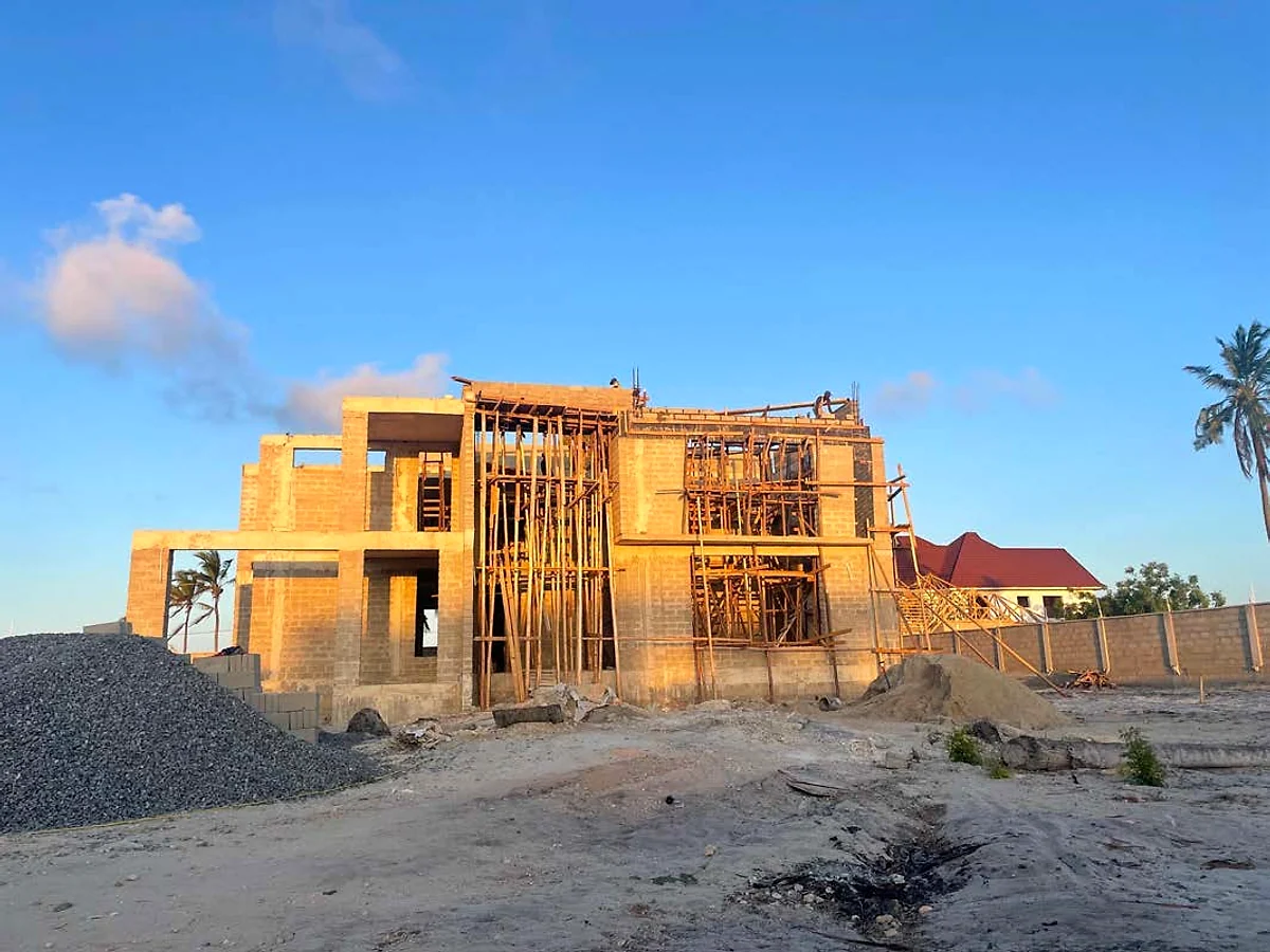 Villa Mbweni JKT — conception à la livraison.